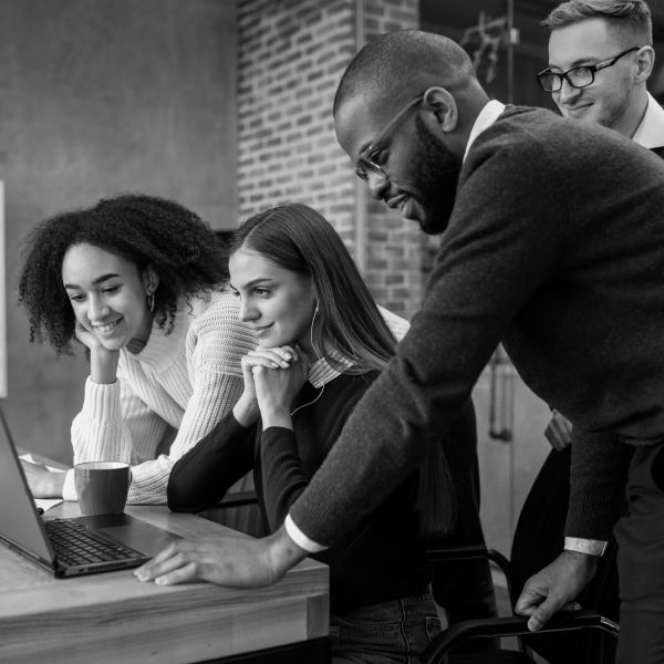 Happy employees using digital business platforms to improve productivity and workplace efficiency